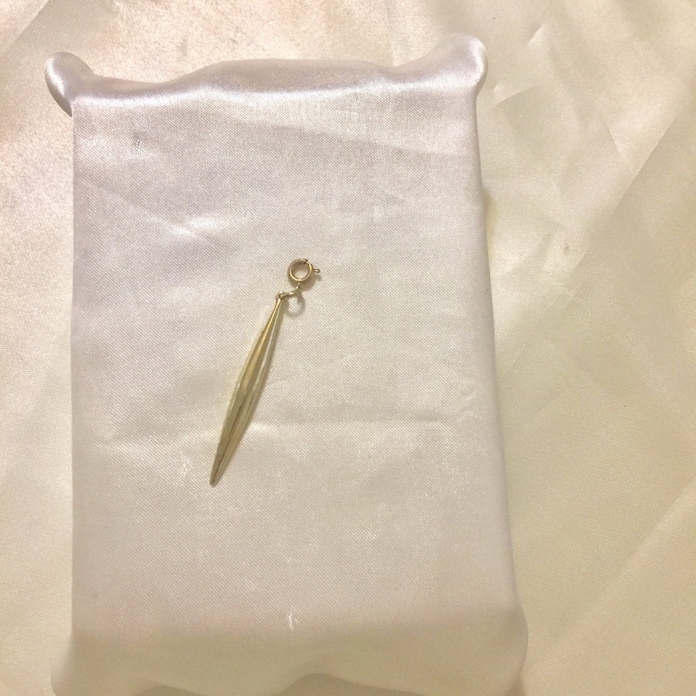 Gold Tone Linear Charm